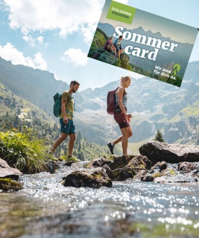Hikers cross rocky stream beneath mountains; Sommer Card banner.